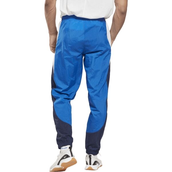 Reebok TRAIN WOVEN PANT Мъжки шушлякови панталони, синьо, Veľkosť M